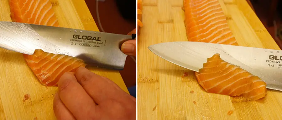 Découpe des tranches de sashimi au saumon